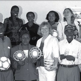 Play materials are handed over to the kindergarten Mugombwa at a visit in 2006